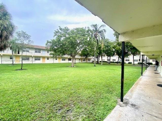 4160 NW 21st St Unit 115E, Lauderhill, FL 33313 - view of grassy yard