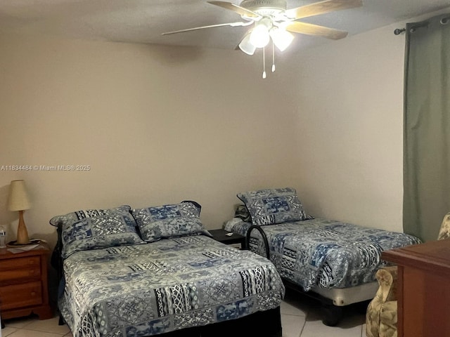 9156 Collins Ave Unit 310, Surfside, FL 33154 - bedroom featuring light tile patterned floors and ceiling fan