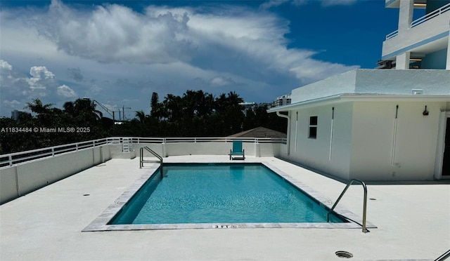 9156 Collins Ave Unit 310, Surfside, FL 33154 - community pool featuring a patio