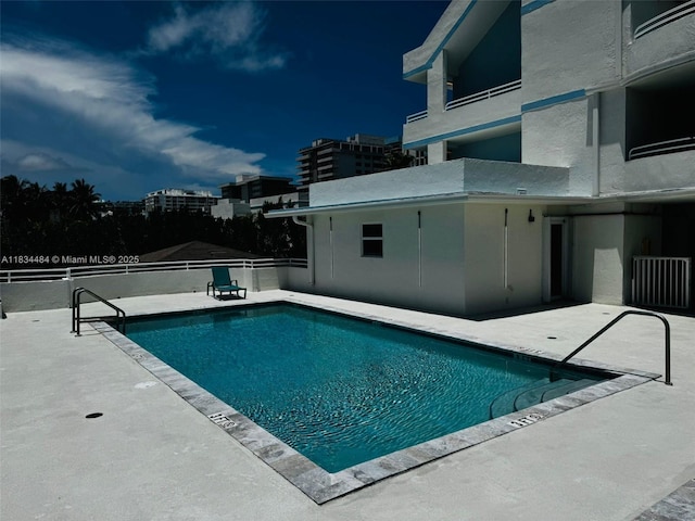 9156 Collins Ave Unit 310, Surfside, FL 33154 - community pool with a patio