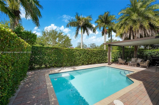 9932 NW 10th St, Miami, FL 33172 - view of swimming pool with a fenced backyard, a patio, and outdoor lounge area