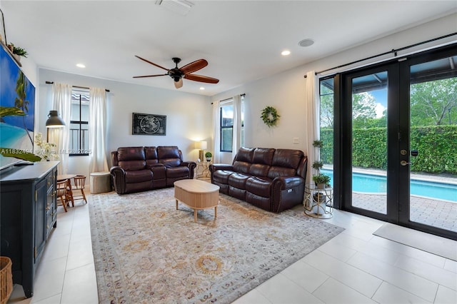 9932 NW 10th St, Miami, FL 33172 - living area with french doors, recessed lighting, ceiling fan, and light tile patterned floors