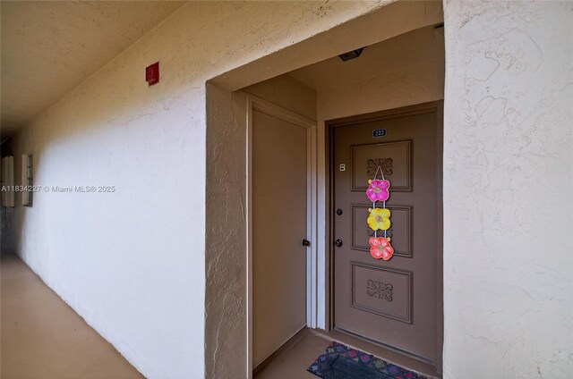 7745 SW 86th St Unit D-222, Miami, FL 33143 - property entrance with stucco siding