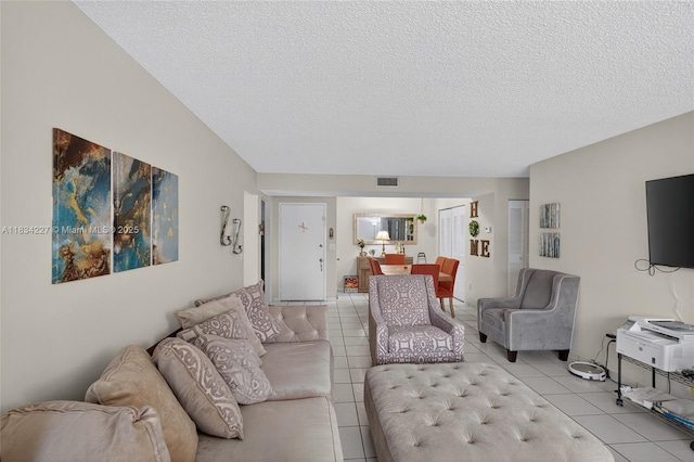 7745 SW 86th St Unit D-222, Miami, FL 33143 - living area featuring tile patterned flooring and a textured ceiling