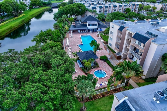 7745 SW 86th St Unit D-222, Miami, FL 33143 - drone / aerial view of a pool area and a nearby body of water