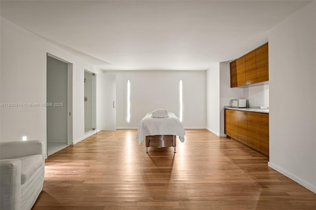 1040 Biscayne Blvd Unit 2108, Miami, FL 33132 - unfurnished living room featuring light wood-style flooring