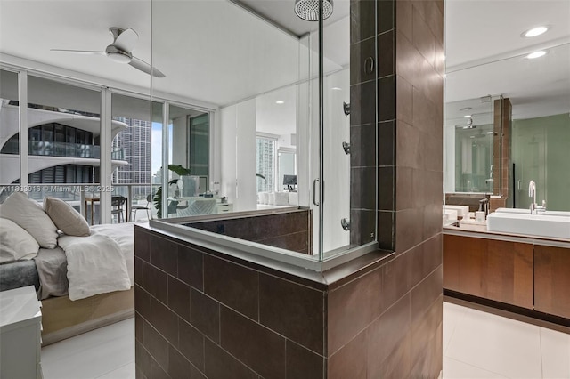 1040 Biscayne Blvd Unit 2108, Miami, FL 33132 - bathroom with a tile shower, vanity, ceiling fan, tile patterned flooring, and recessed lighting