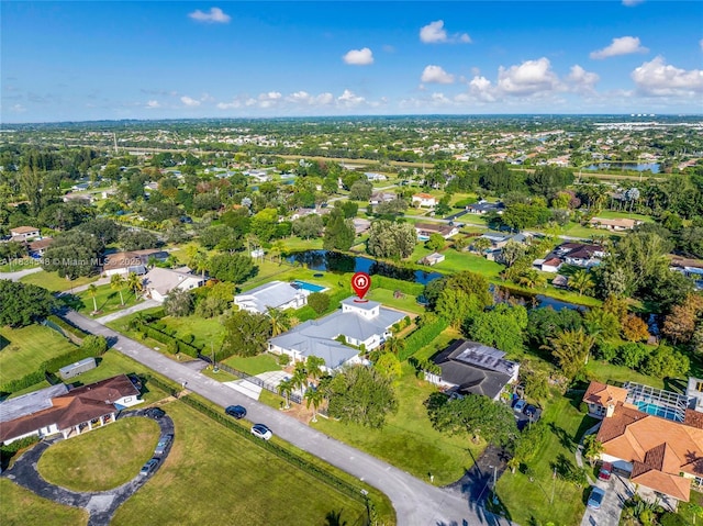 16701 SW 49th St, Southwest Ranches, FL 33331 - aerial view of property's location featuring a nearby body of water and nearby suburban area