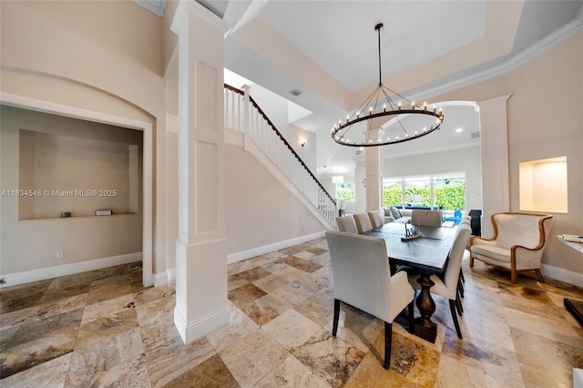 16701 SW 49th St, Southwest Ranches, FL 33331 - dining room with a chandelier, stairs, decorative columns, a towering ceiling, and ornamental molding