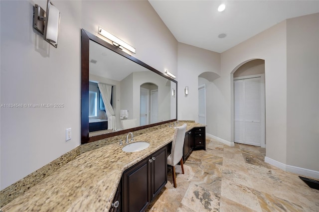 16701 SW 49th St, Southwest Ranches, FL 33331 - full bathroom with vanity and stone finish floors