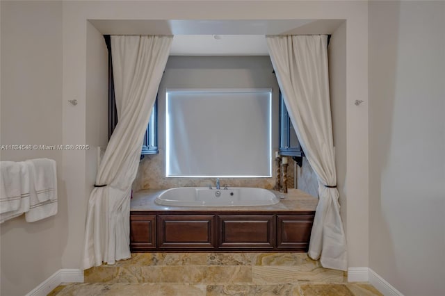 16701 SW 49th St, Southwest Ranches, FL 33331 - bathroom featuring baseboards and a bath