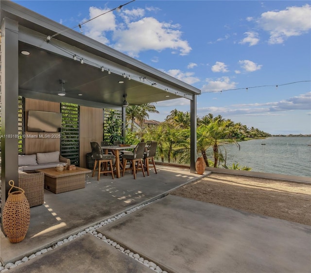 18269 SW 54th St, Miramar, FL 33029 - view of patio / terrace with a water view, outdoor dining space, ceiling fan, and an outdoor hangout area