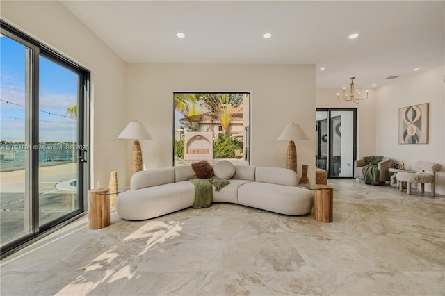 18269 SW 54th St, Miramar, FL 33029 - living room featuring a chandelier and recessed lighting