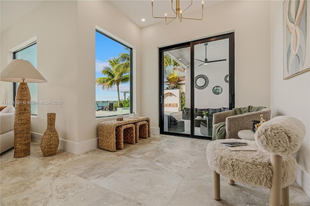18269 SW 54th St, Miramar, FL 33029 - sitting room with a chandelier, marble finish flooring, and ceiling fan