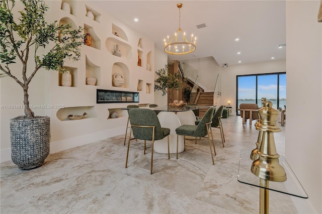 18269 SW 54th St, Miramar, FL 33029 - dining area featuring marble tiled flooring, stairs, a chandelier, and recessed lighting