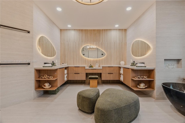18269 SW 54th St, Miramar, FL 33029 - bathroom with two vanities, a freestanding tub, and recessed lighting