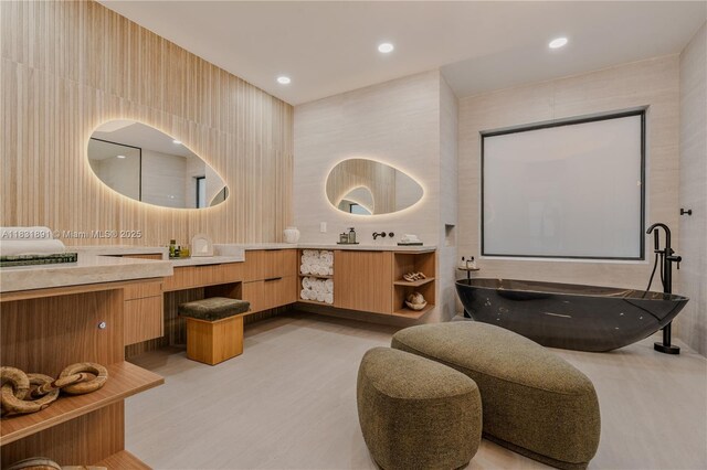 18269 SW 54th St, Miramar, FL 33029 - bathroom with vanity, a freestanding bath, wood finished floors, and recessed lighting