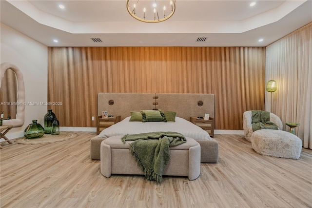 18269 SW 54th St, Miramar, FL 33029 - bedroom with a raised ceiling, a chandelier, wood finished floors, recessed lighting, and wooden walls