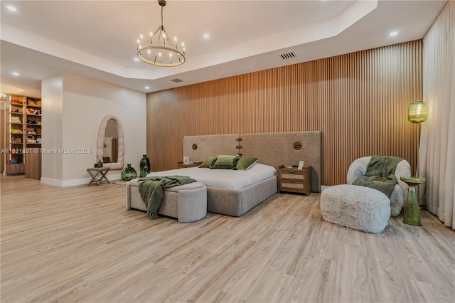 18269 SW 54th St, Miramar, FL 33029 - bedroom featuring a raised ceiling, a chandelier, wood finished floors, recessed lighting, and wood walls