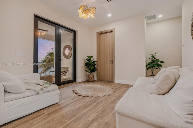 18269 SW 54th St, Miramar, FL 33029 - living area with light wood-type flooring, a chandelier, and recessed lighting
