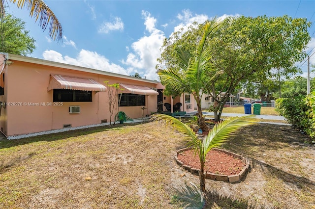 1430 NE 148th St, Miami, FL 33161 - rear view of house featuring stucco siding