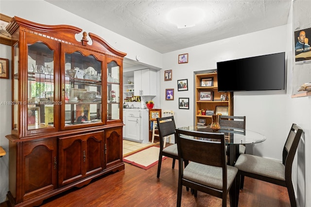 1430 NE 148th St, Miami, FL 33161 - dining room with dark wood-style floors and a textured ceiling