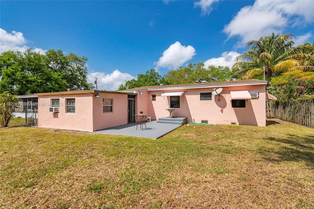 1430 NE 148th St, Miami, FL 33161 - rear view of house with a patio area and stucco siding