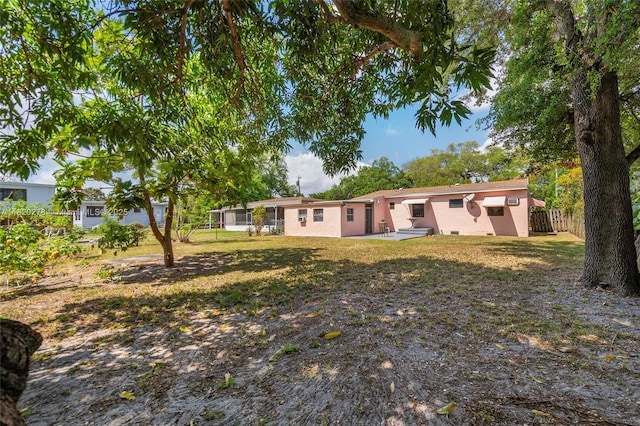 1430 NE 148th St, Miami, FL 33161 - rear view of house with stucco siding