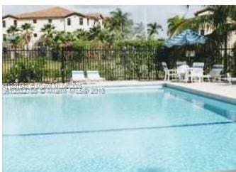 9421 Fontainebleau Blvd Unit 206-35, Miami, FL 33172 - community pool with a patio area
