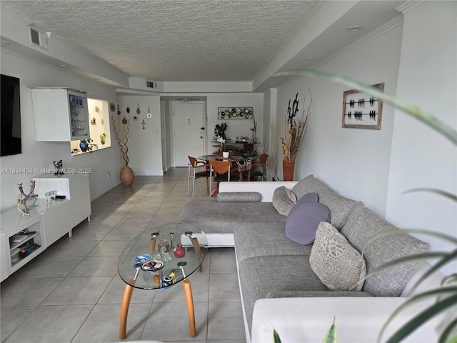 1000 Parkview Dr Unit 114, Hallandale Beach, FL 33009 - tiled living area with a textured ceiling
