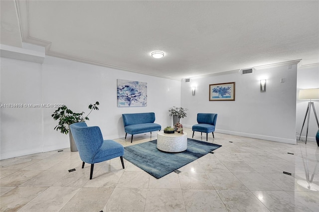 1000 Parkview Dr Unit 114, Hallandale Beach, FL 33009 - living area featuring crown molding and a textured ceiling