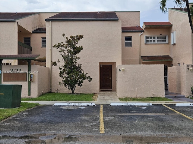 9199 Fontainebleau Blvd Unit 6, Miami, FL 33172 - townhome / multi-family property featuring uncovered parking and stucco siding