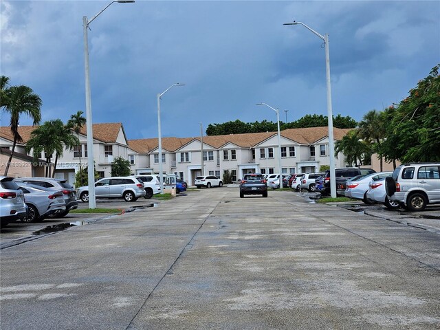 9199 Fontainebleau Blvd Unit 6, Miami, FL 33172 - uncovered parking lot with a residential view