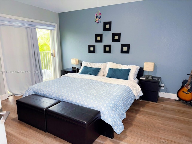 11405 Lakeview Dr Unit 3-A, Coral Springs, FL 33071 - bedroom featuring access to outside and wood finished floors