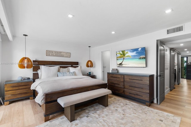 4000 NE 168th St Unit 113B, North Miami Beach, FL 33160 - bedroom with light wood-style floors and recessed lighting
