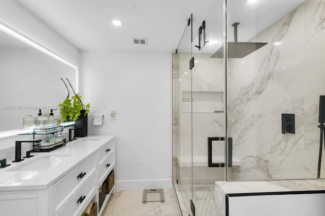 4000 NE 168th St Unit 113B, North Miami Beach, FL 33160 - bathroom featuring a marble finish shower, double vanity, and marble finish floors