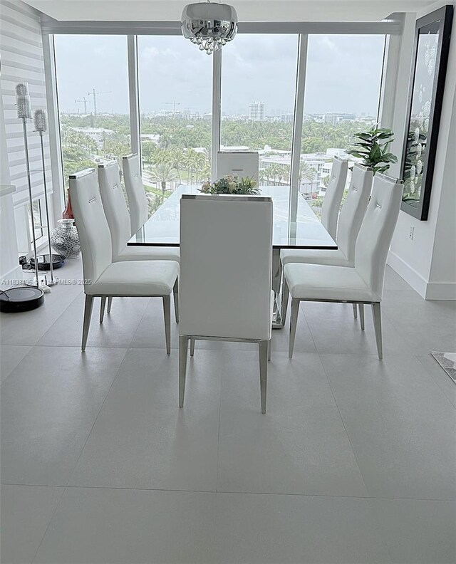10275 Collins Ave Unit 722, Bal Harbour, FL 33154 - dining area featuring a chandelier and a view of city