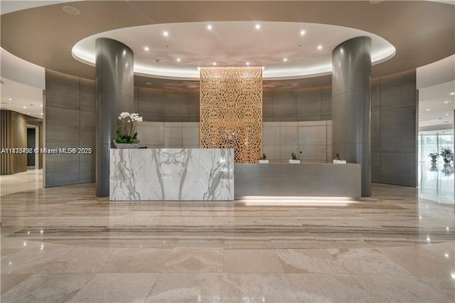 10275 Collins Ave Unit 722, Bal Harbour, FL 33154 - reception featuring a high ceiling and recessed lighting