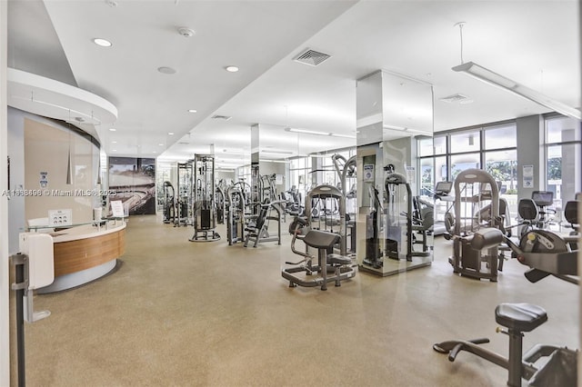 10275 Collins Ave Unit 722, Bal Harbour, FL 33154 - exercise room featuring recessed lighting and expansive windows