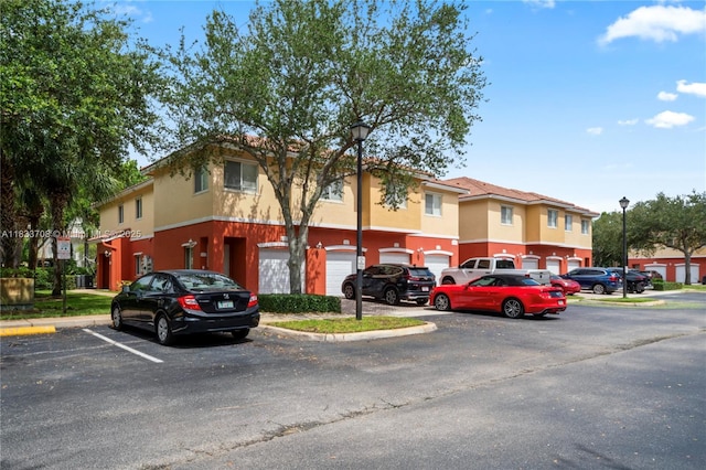 3335 Palomino Dr, Davie, FL 33024 - view of front of house with uncovered parking and stucco siding