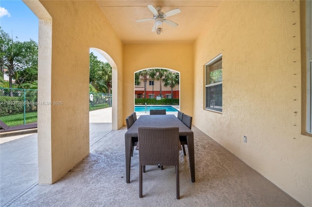 3335 Palomino Dr, Davie, FL 33024 - view of patio with ceiling fan and a community pool