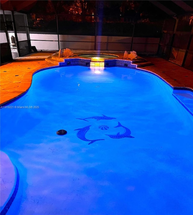 9017 SW 157th Path, Miami, FL 33196 - view of swimming pool with an in-ground hot tub and glass enclosure