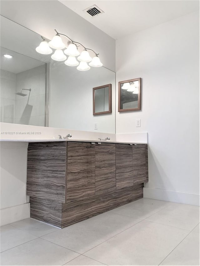 9017 SW 157th Path, Miami, FL 33196 - bathroom with double vanity, tile patterned flooring, and a shower