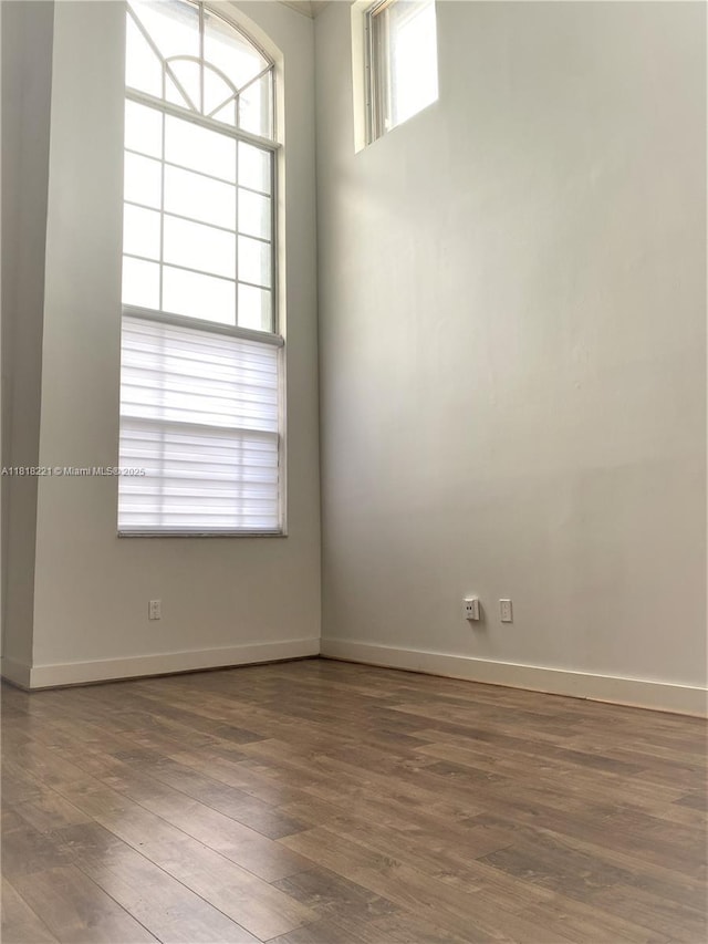 9017 SW 157th Path, Miami, FL 33196 - unfurnished room featuring wood finished floors and baseboards