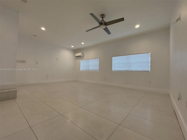 9017 SW 157th Path, Miami, FL 33196 - empty room featuring recessed lighting, light tile patterned floors, a wall unit AC, and a ceiling fan