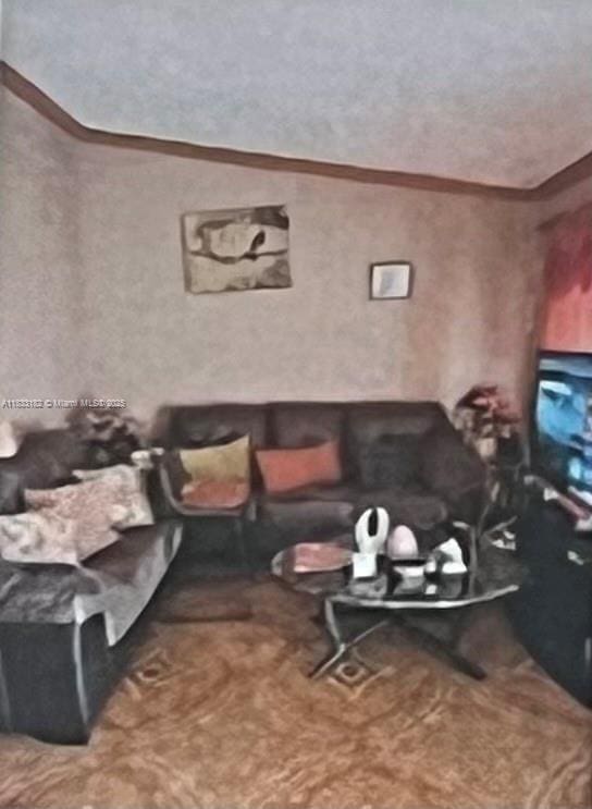 12625 NW 1st Ct, North Miami, FL 33168 - living area featuring crown molding