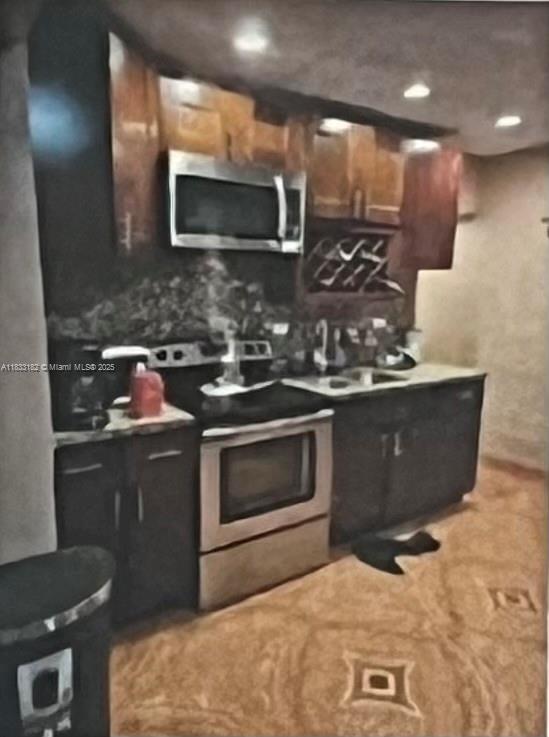 12625 NW 1st Ct, North Miami, FL 33168 - kitchen with appliances with stainless steel finishes and recessed lighting