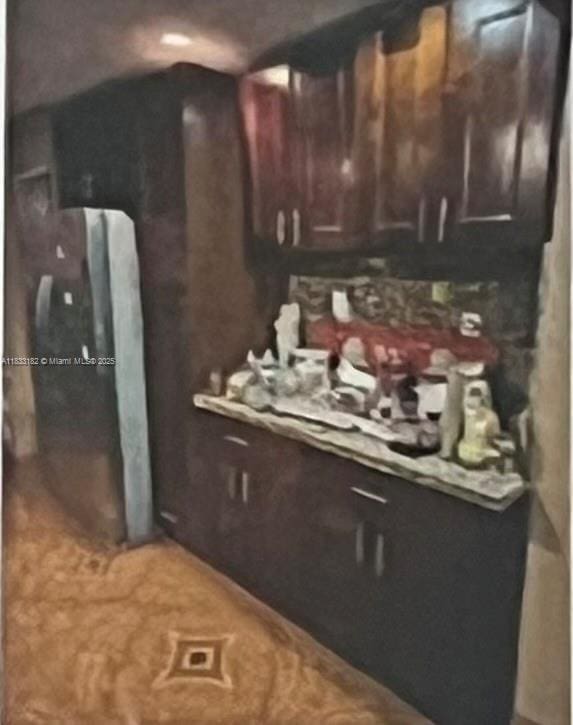 12625 NW 1st Ct, North Miami, FL 33168 - kitchen featuring dark brown cabinetry