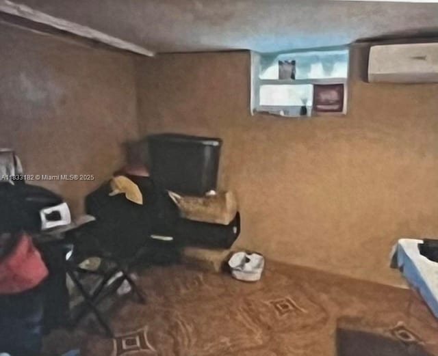 12625 NW 1st Ct, North Miami, FL 33168 - bedroom with a wall mounted air conditioner and carpet