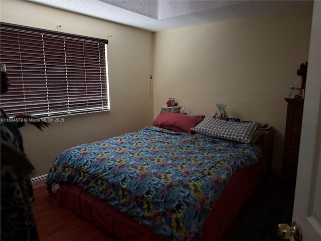 1851 SW 101st Way, Miramar, FL 33025 - bedroom with wood finished floors and a textured ceiling
